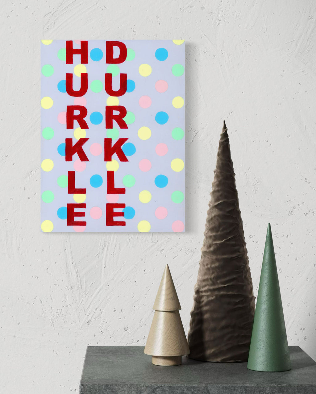 Bold red letters dance on a pastel polka dot background, creating a lively tapestry of text and colour.