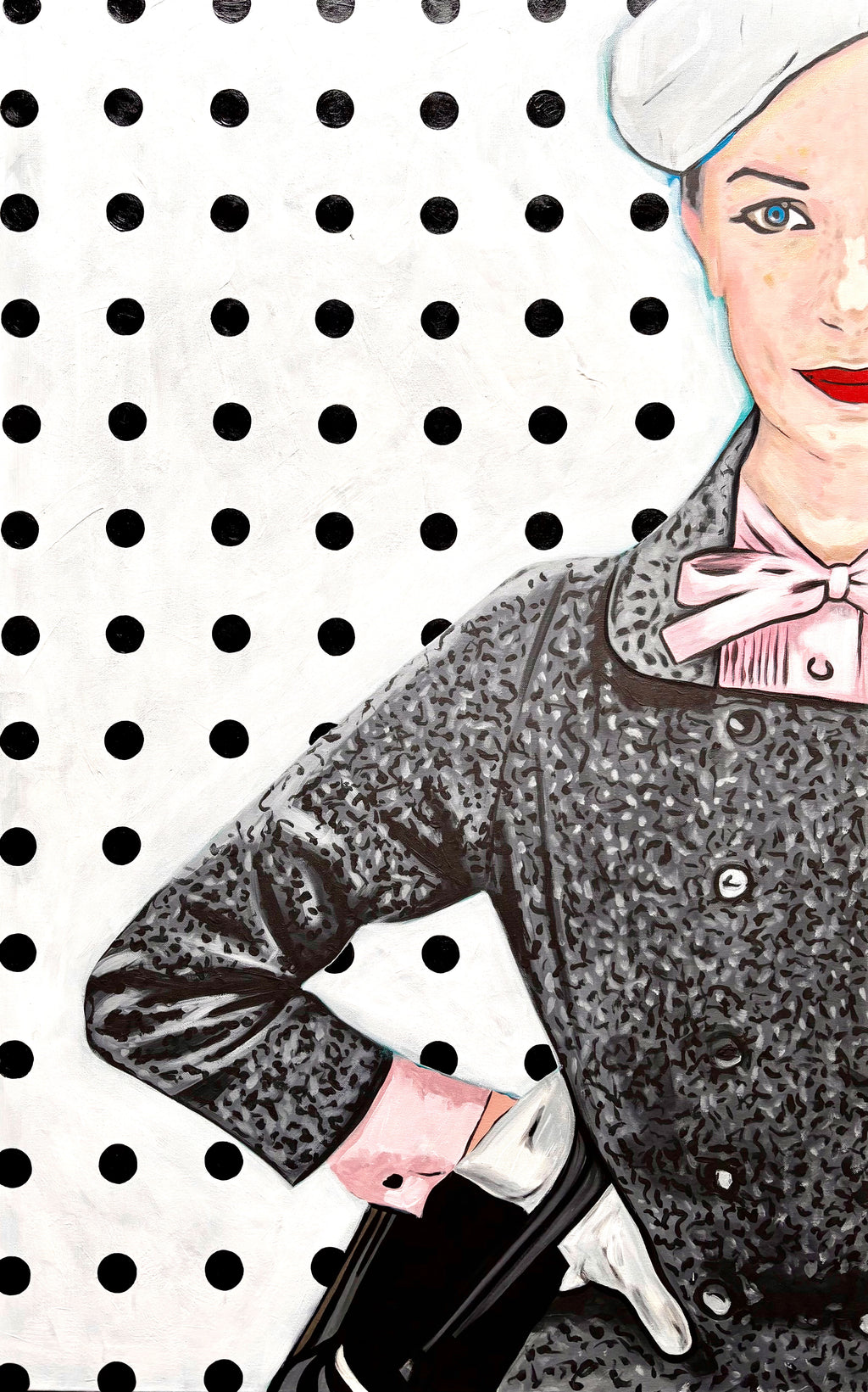 Limited edition print of a woman in a grey coat with a pink bow against a polka dot background.