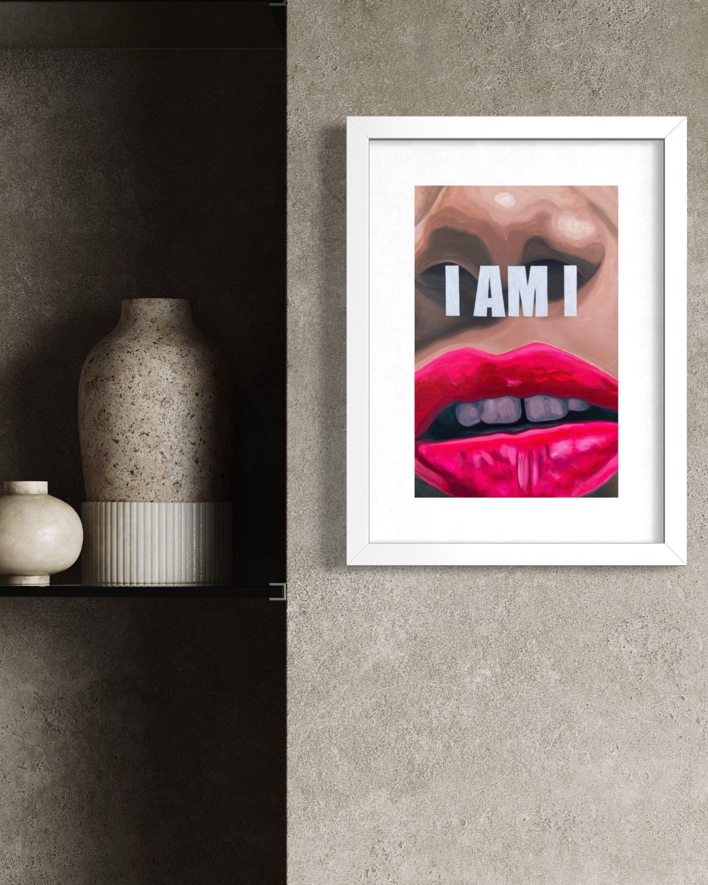 Framed limited edition print with a bold lip and text on a textured wall.