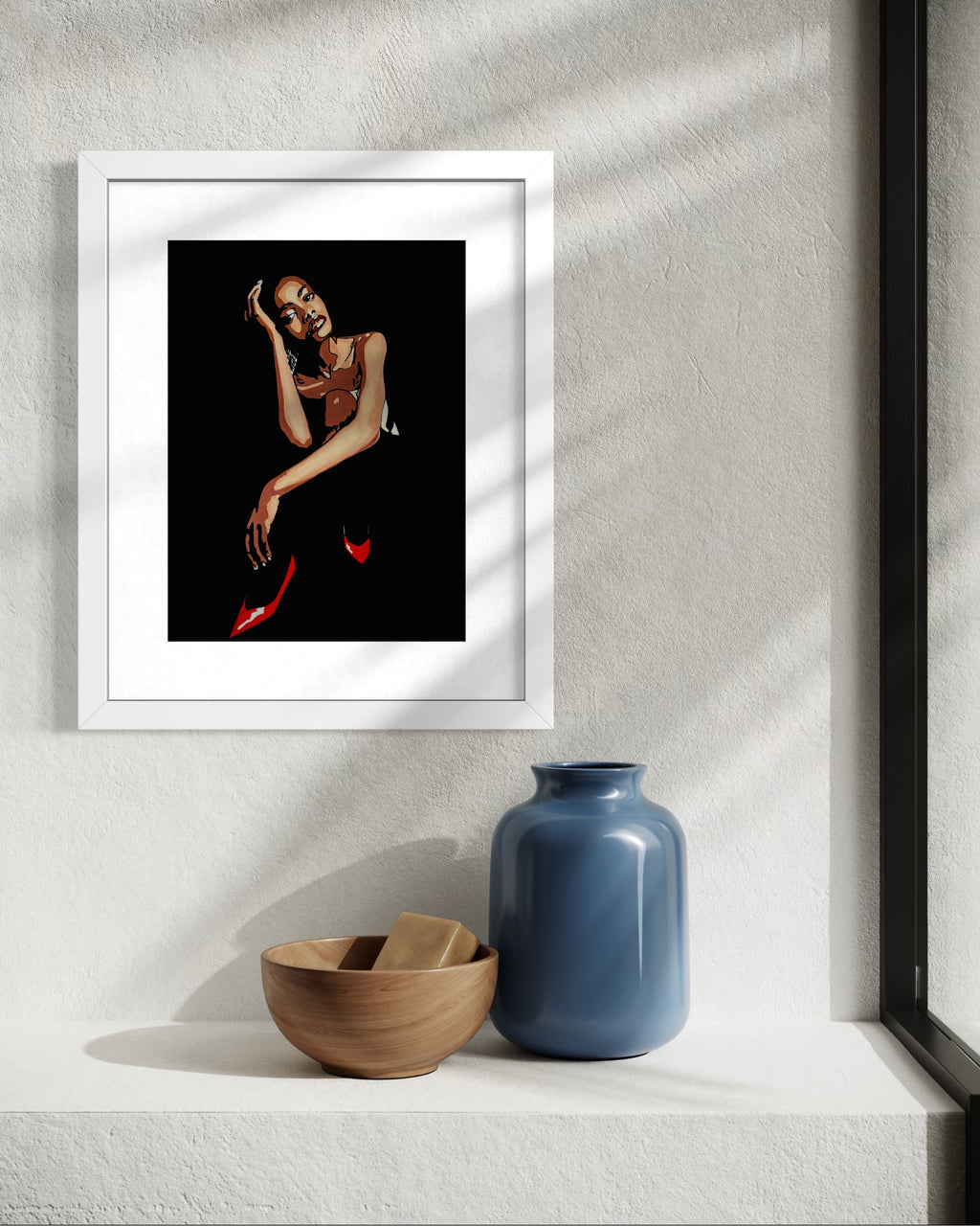 Framed artwork of a woman on a wall with decorative items below.  Limited edition print by Annie Pritchard