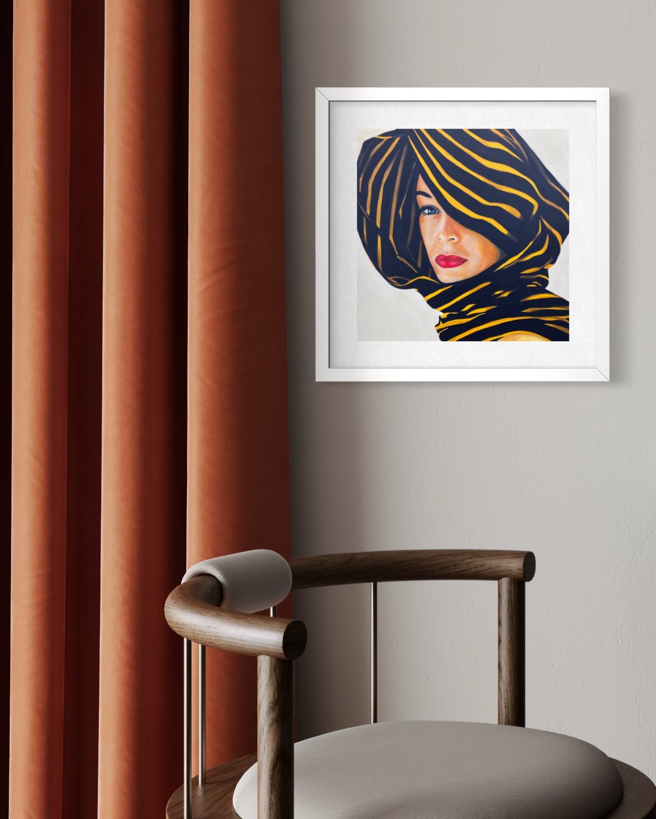 Framed limited edition print of a woman with a patterned headscarf on a gray wall next to a chair and red curtains.
